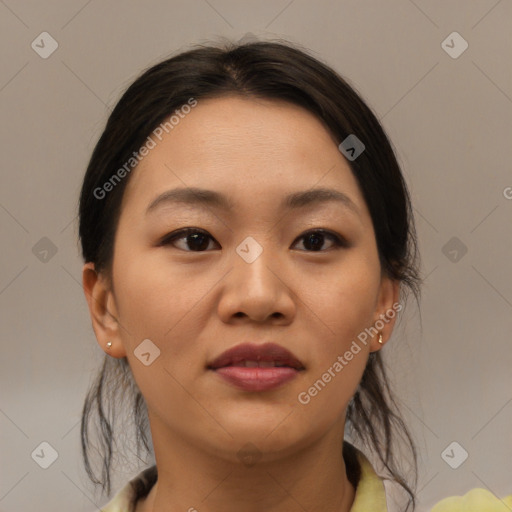 Joyful asian young-adult female with medium  brown hair and brown eyes