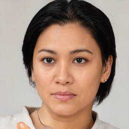 Neutral asian young-adult female with medium  black hair and brown eyes