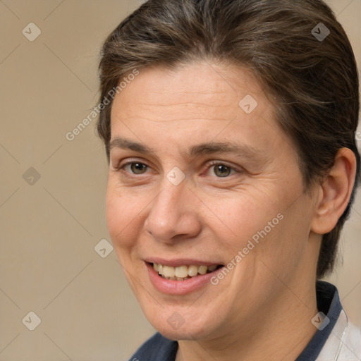 Joyful white adult female with short  brown hair and brown eyes