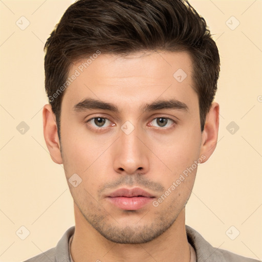 Neutral white young-adult male with short  brown hair and brown eyes