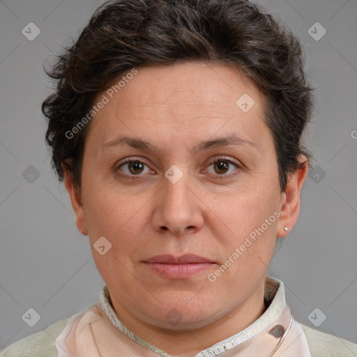 Joyful white adult female with short  brown hair and brown eyes