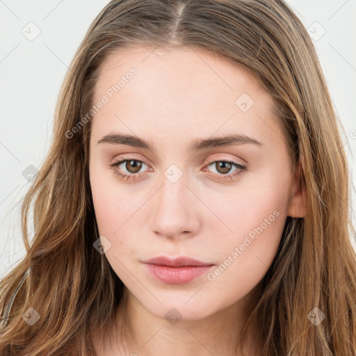 Neutral white young-adult female with long  brown hair and brown eyes