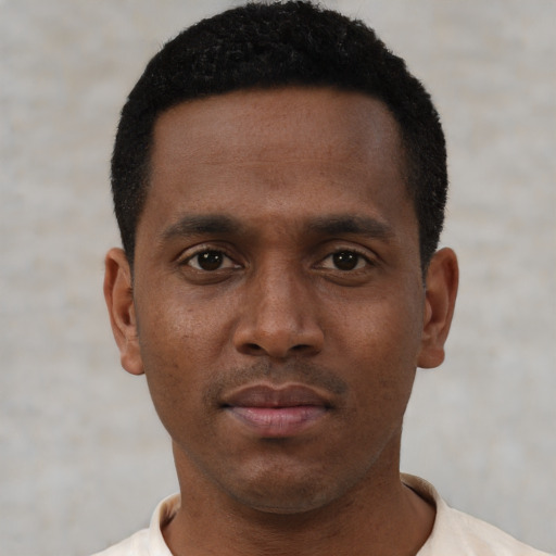 Neutral black young-adult male with short  black hair and brown eyes