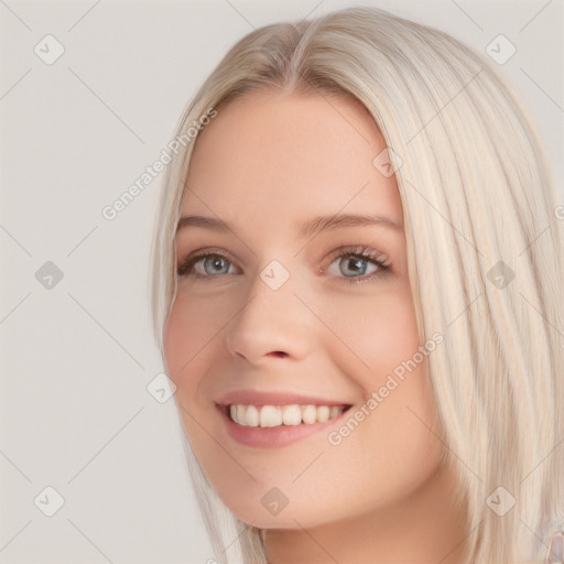 Joyful white young-adult female with long  brown hair and blue eyes