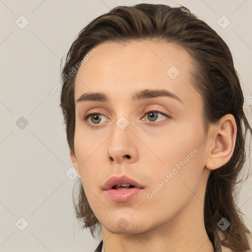 Neutral white young-adult female with medium  brown hair and brown eyes