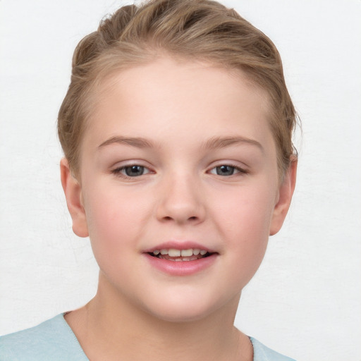 Joyful white child female with short  brown hair and brown eyes