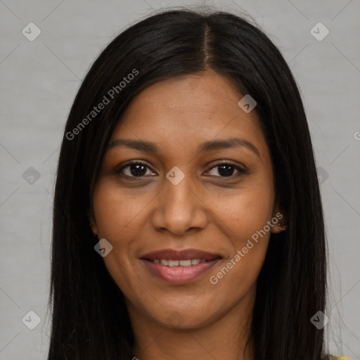 Joyful black young-adult female with long  brown hair and brown eyes