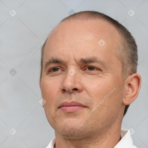 Neutral white adult male with short  brown hair and brown eyes