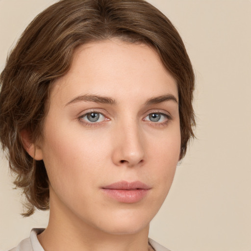 Neutral white young-adult female with medium  brown hair and green eyes