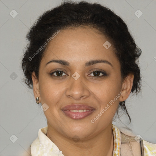 Joyful latino adult female with medium  brown hair and brown eyes