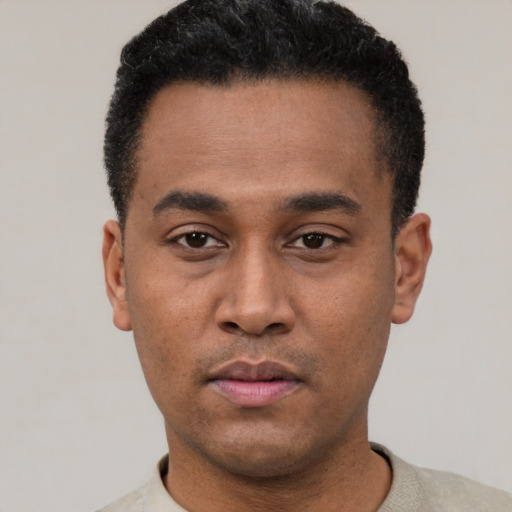 Neutral latino young-adult male with short  black hair and brown eyes