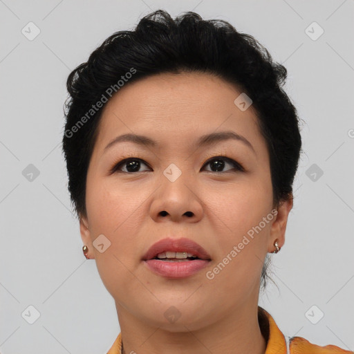 Joyful asian young-adult female with short  brown hair and brown eyes