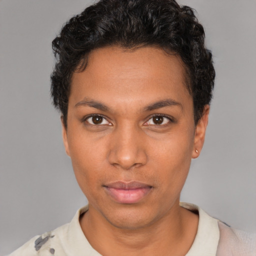 Neutral white young-adult female with short  black hair and brown eyes