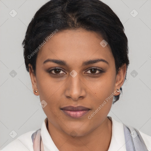 Joyful latino young-adult female with short  brown hair and brown eyes