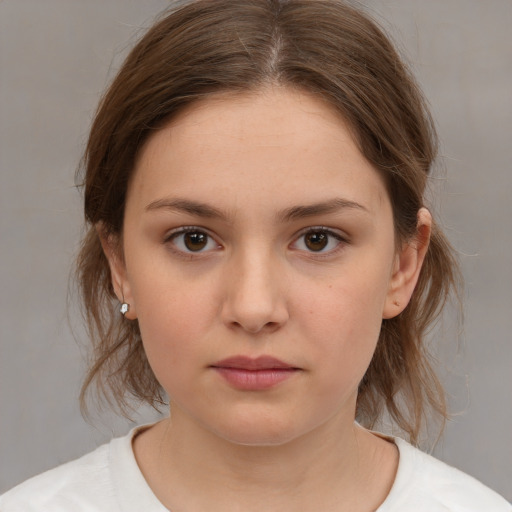 Neutral white young-adult female with medium  brown hair and brown eyes