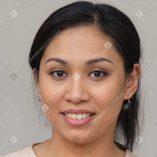 Joyful asian young-adult female with medium  brown hair and brown eyes