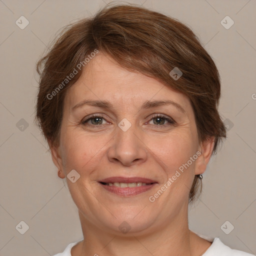 Joyful white adult female with medium  brown hair and brown eyes