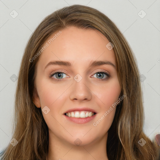 Joyful white young-adult female with long  brown hair and grey eyes