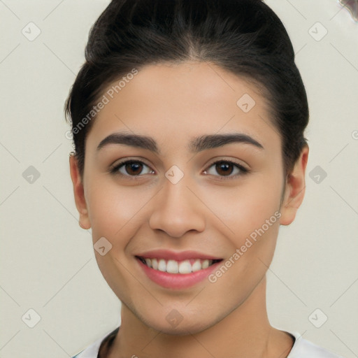 Joyful white young-adult female with short  black hair and brown eyes