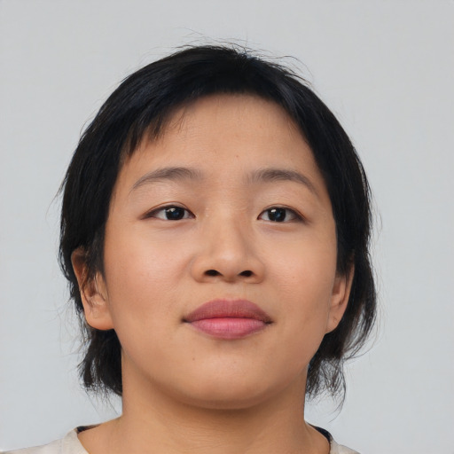 Neutral asian young-adult female with medium  brown hair and brown eyes