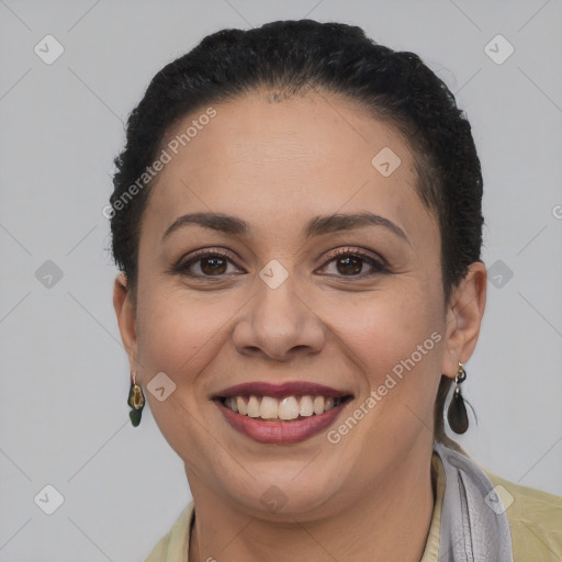 Joyful latino young-adult female with short  brown hair and brown eyes