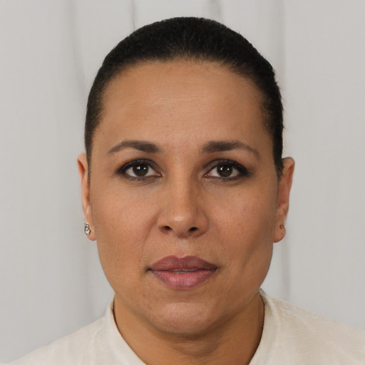 Neutral black young-adult female with short  black hair and brown eyes