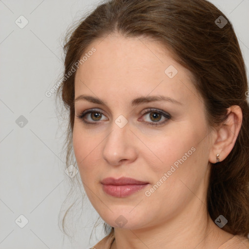 Joyful white young-adult female with medium  brown hair and green eyes