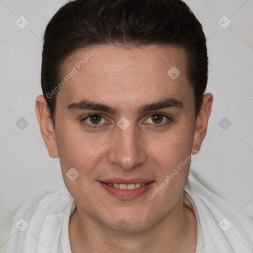 Joyful white young-adult male with short  brown hair and brown eyes