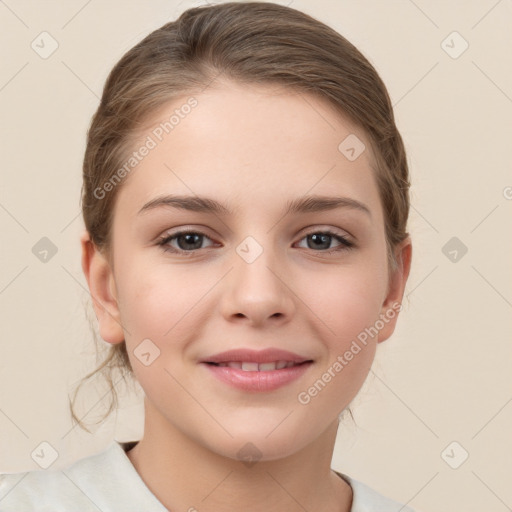 Joyful white child female with medium  brown hair and brown eyes