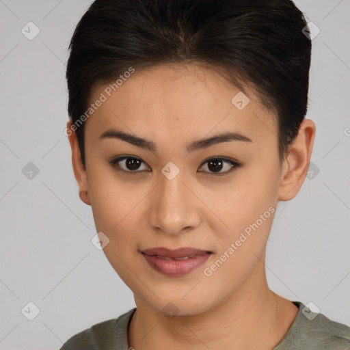 Joyful asian young-adult female with short  brown hair and brown eyes