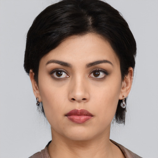 Neutral asian young-adult female with medium  black hair and brown eyes