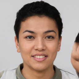 Joyful asian young-adult female with short  brown hair and brown eyes