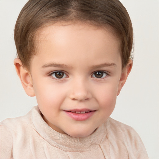 Joyful white child female with short  brown hair and brown eyes