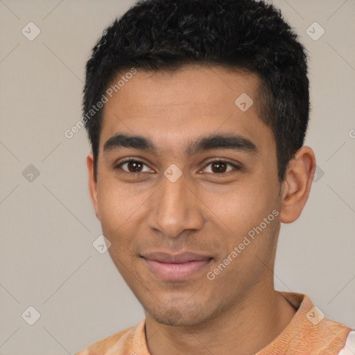 Joyful latino young-adult male with short  black hair and brown eyes