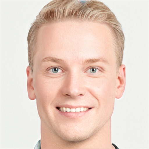 Joyful white young-adult male with short  brown hair and blue eyes