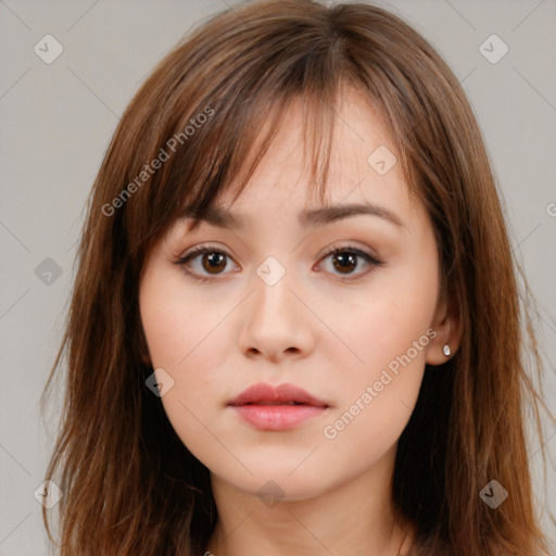 Neutral white young-adult female with long  brown hair and brown eyes