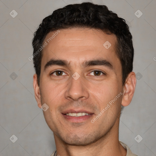 Joyful white young-adult male with short  black hair and brown eyes