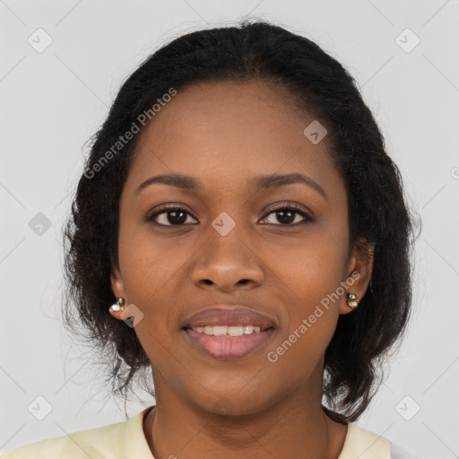 Joyful black young-adult female with long  brown hair and brown eyes