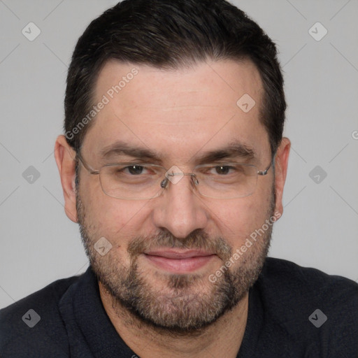 Joyful white adult male with short  black hair and brown eyes