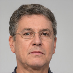 Neutral white middle-aged male with short  brown hair and brown eyes