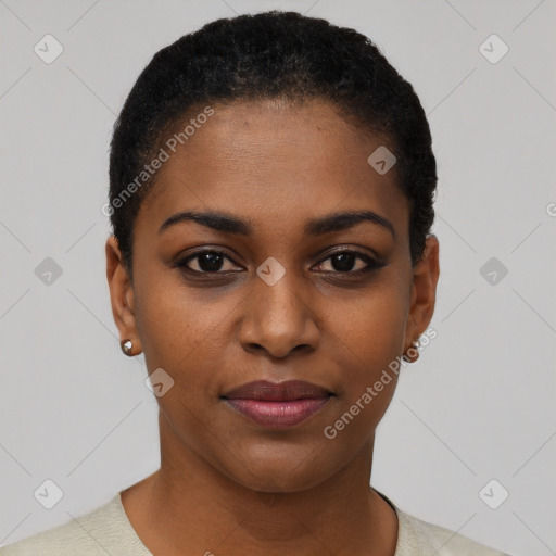 Joyful black young-adult female with short  black hair and brown eyes