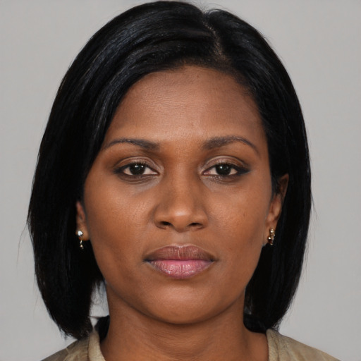 Neutral black young-adult female with medium  black hair and brown eyes