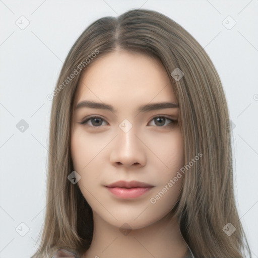 Neutral white young-adult female with long  brown hair and brown eyes