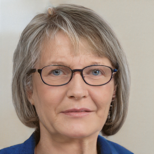 Joyful white middle-aged female with medium  brown hair and blue eyes