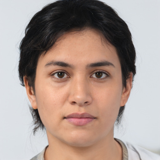 Neutral asian young-adult female with medium  brown hair and brown eyes