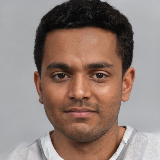 Neutral black young-adult male with short  black hair and brown eyes