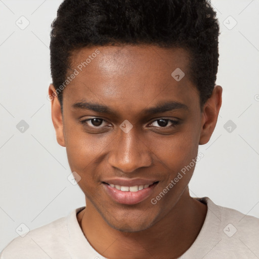 Joyful black young-adult male with short  brown hair and brown eyes