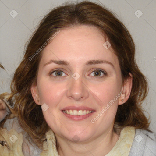 Joyful white adult female with medium  brown hair and blue eyes