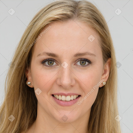 Joyful white young-adult female with long  brown hair and green eyes