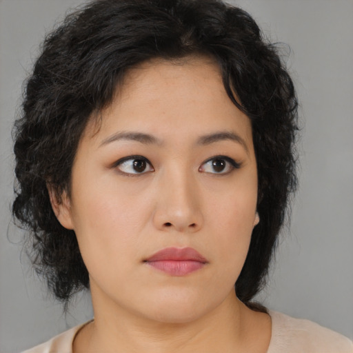Neutral asian young-adult female with medium  brown hair and brown eyes